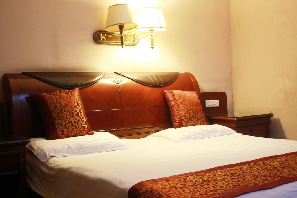 Taizhou Taishan Business Hotel Quarto foto