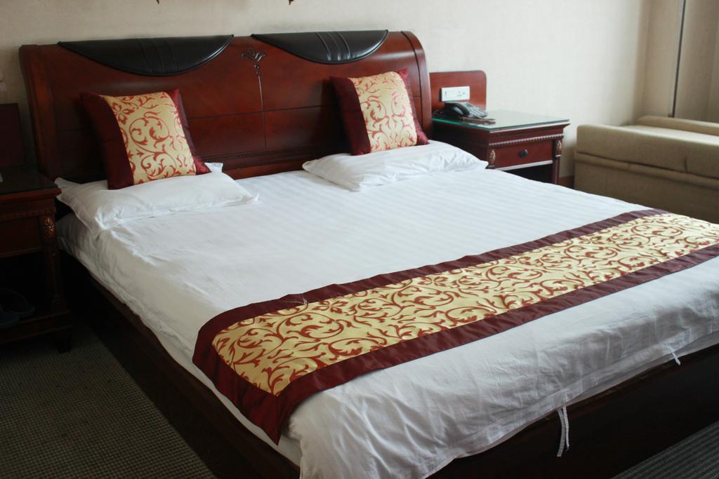 Taizhou Taishan Business Hotel Quarto foto