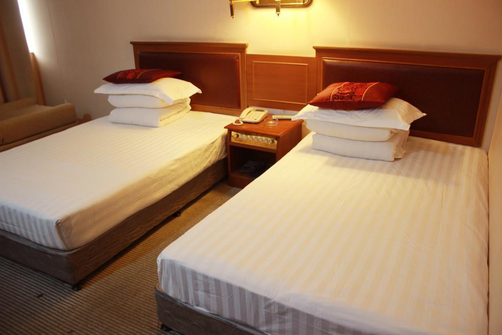 Taizhou Taishan Business Hotel Quarto foto