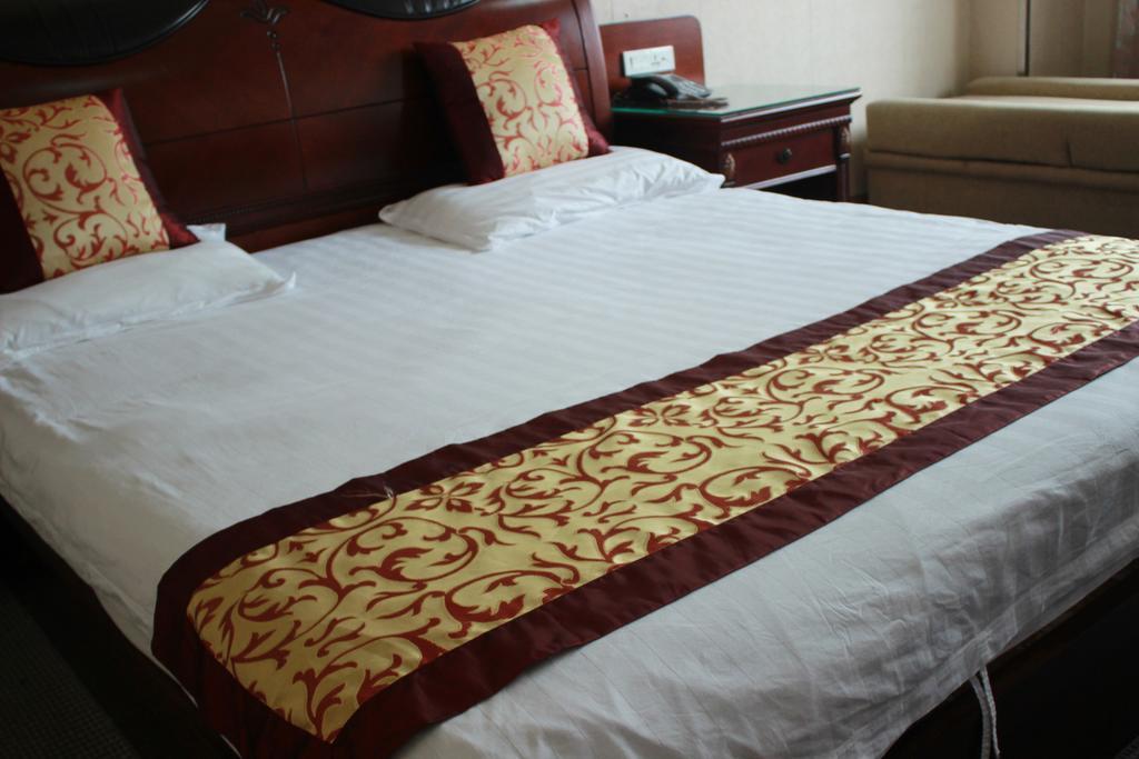 Taizhou Taishan Business Hotel Quarto foto