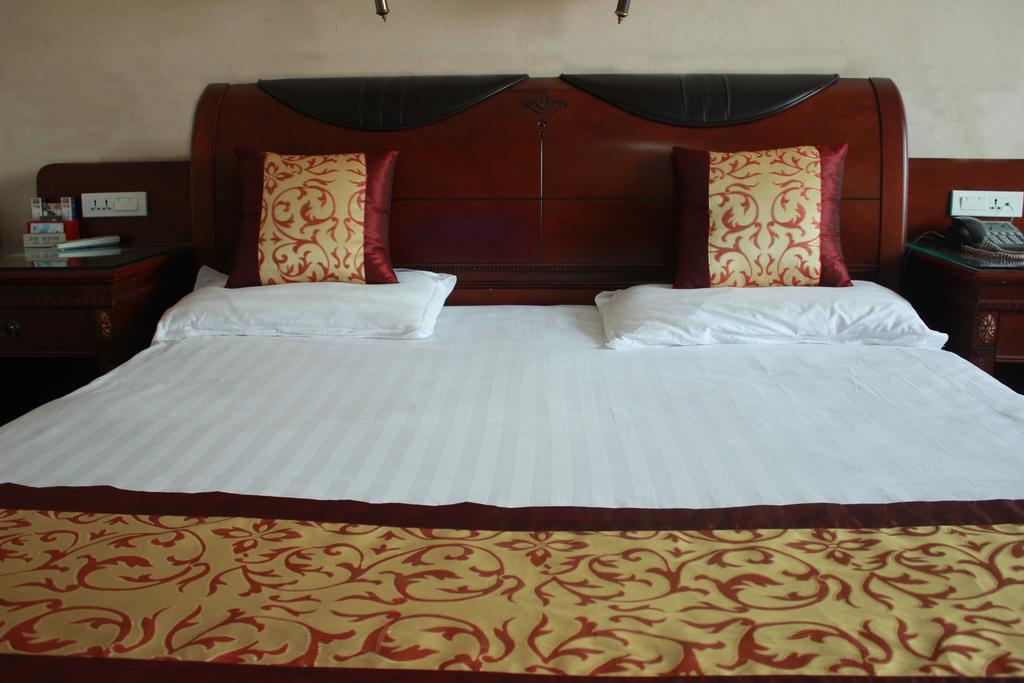 Taizhou Taishan Business Hotel Quarto foto